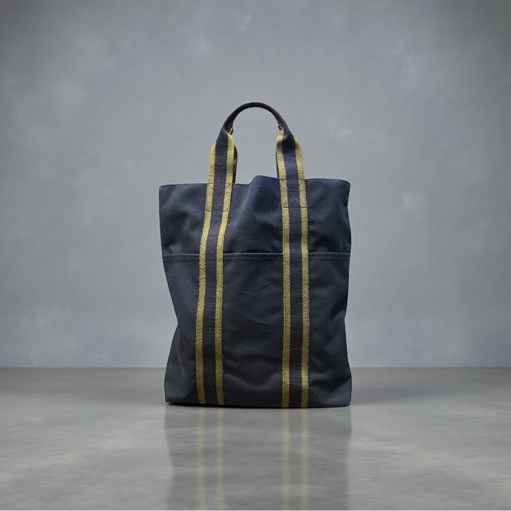 Hermès Vertical Fourre-Tote Navy Blue Canvas & striped webbing handles/trim.